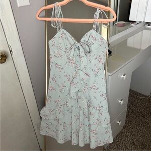 cider blue and pink floral dress with ruffles, bow tie straps, & front bow/knot